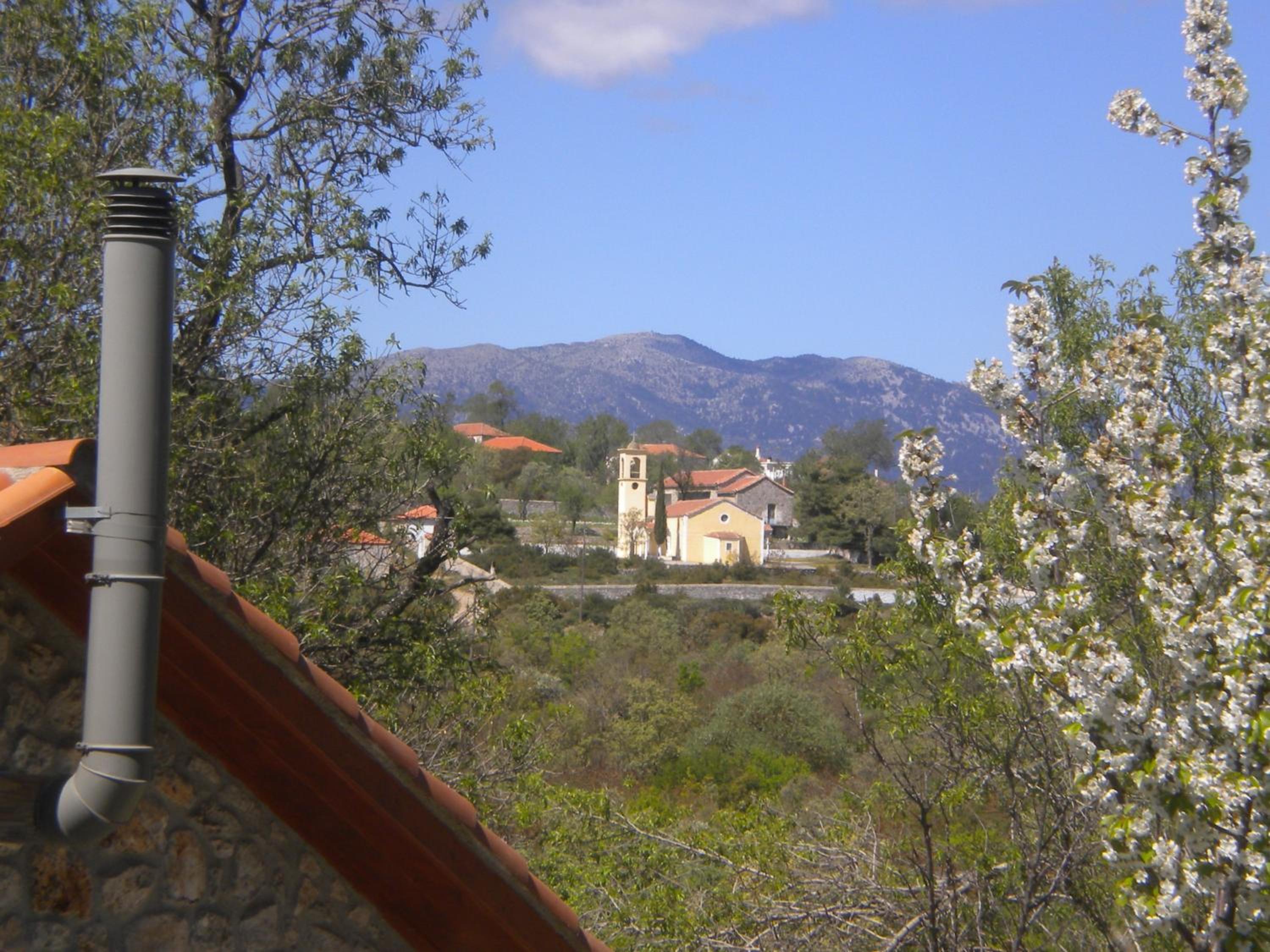 Amygdalia, a Stone House in a quiet landscape view 3