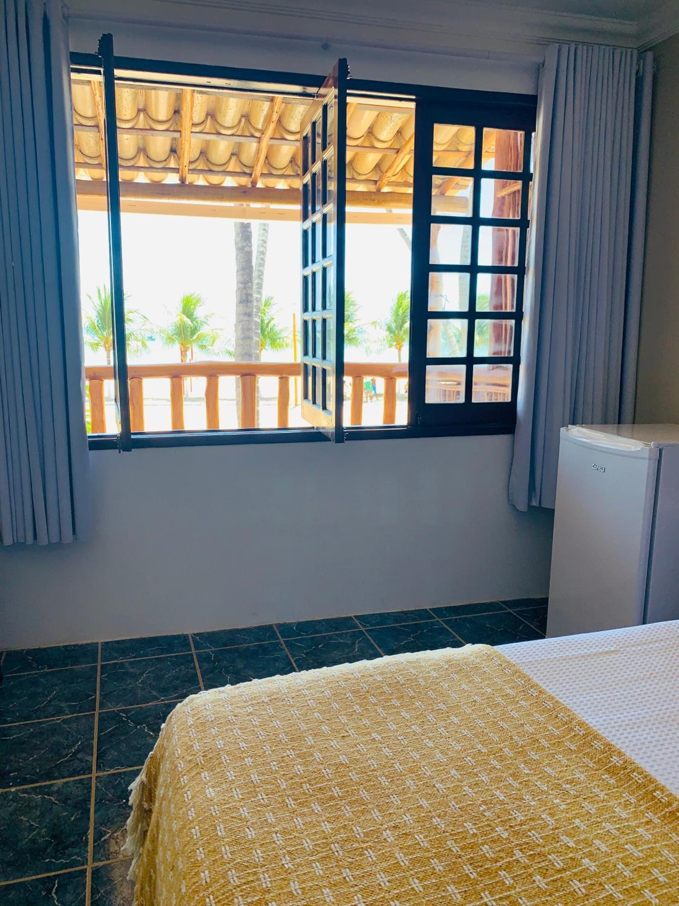 Suíte frente mar e pés na areia