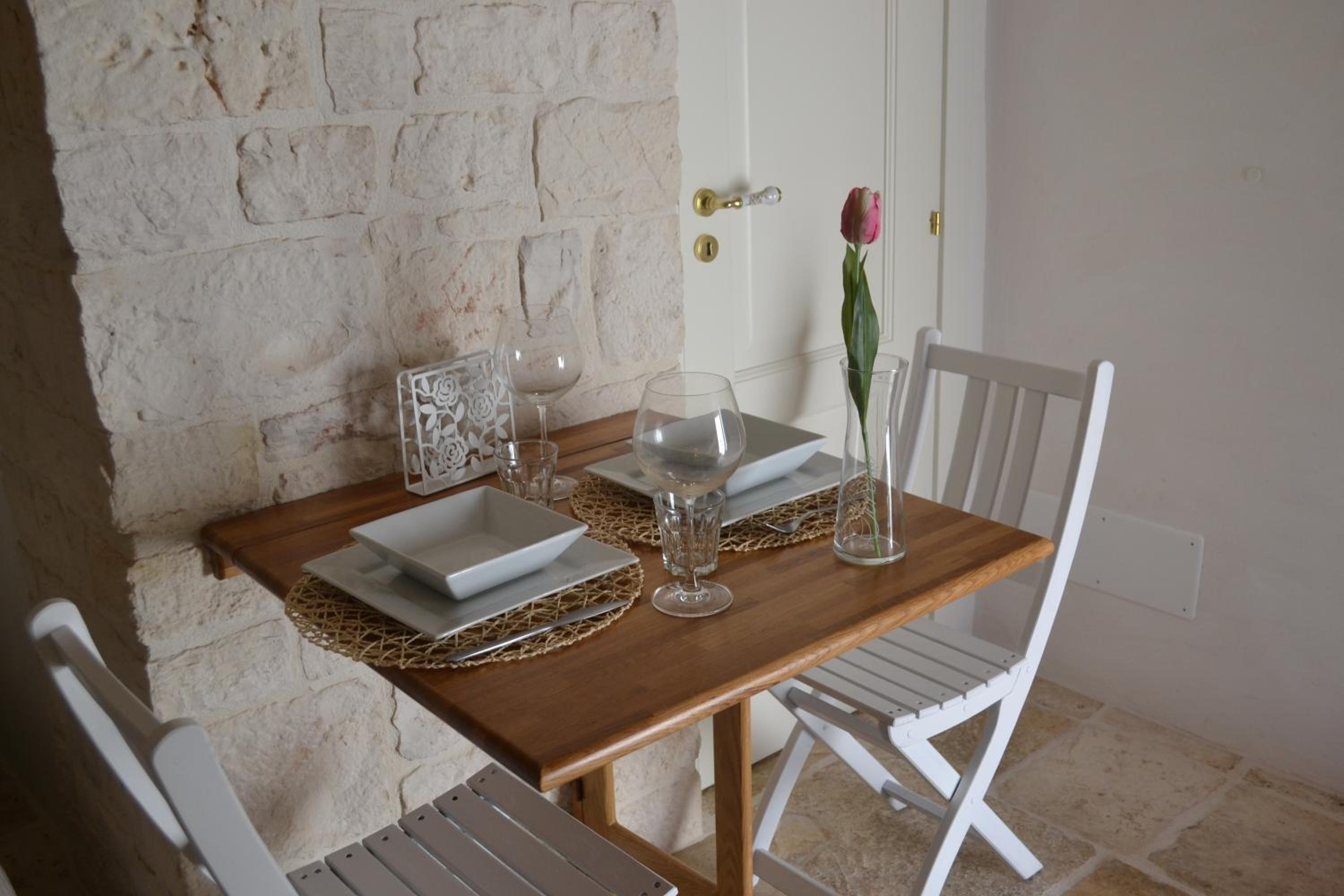 Conversa De Amicis casa de vacaciones Alberobello — dining