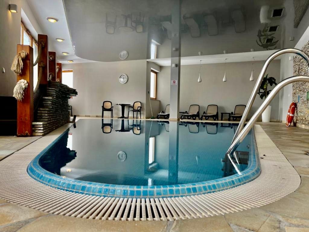 Apartament Złote Tarasy ApartamentyZakopianskie Basen Sauna Jacuzzi view 2