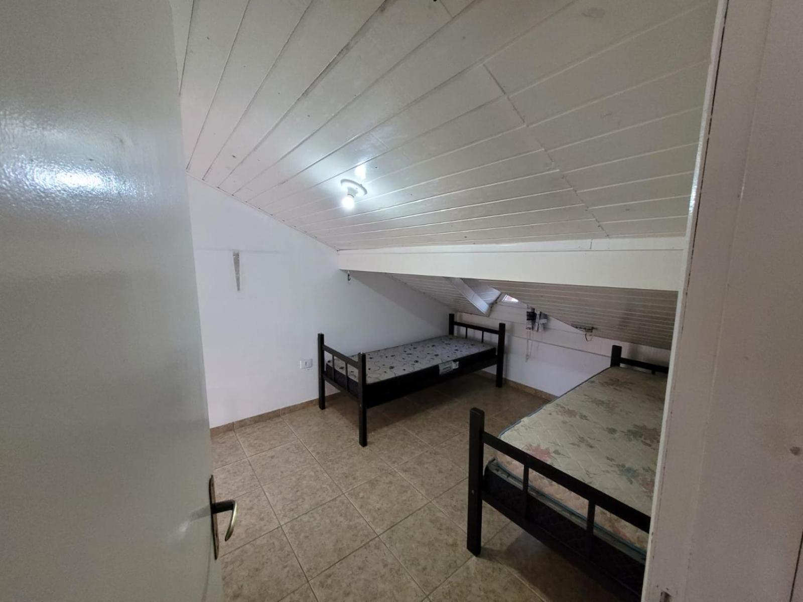Casa com piscina a 50 metros da praia