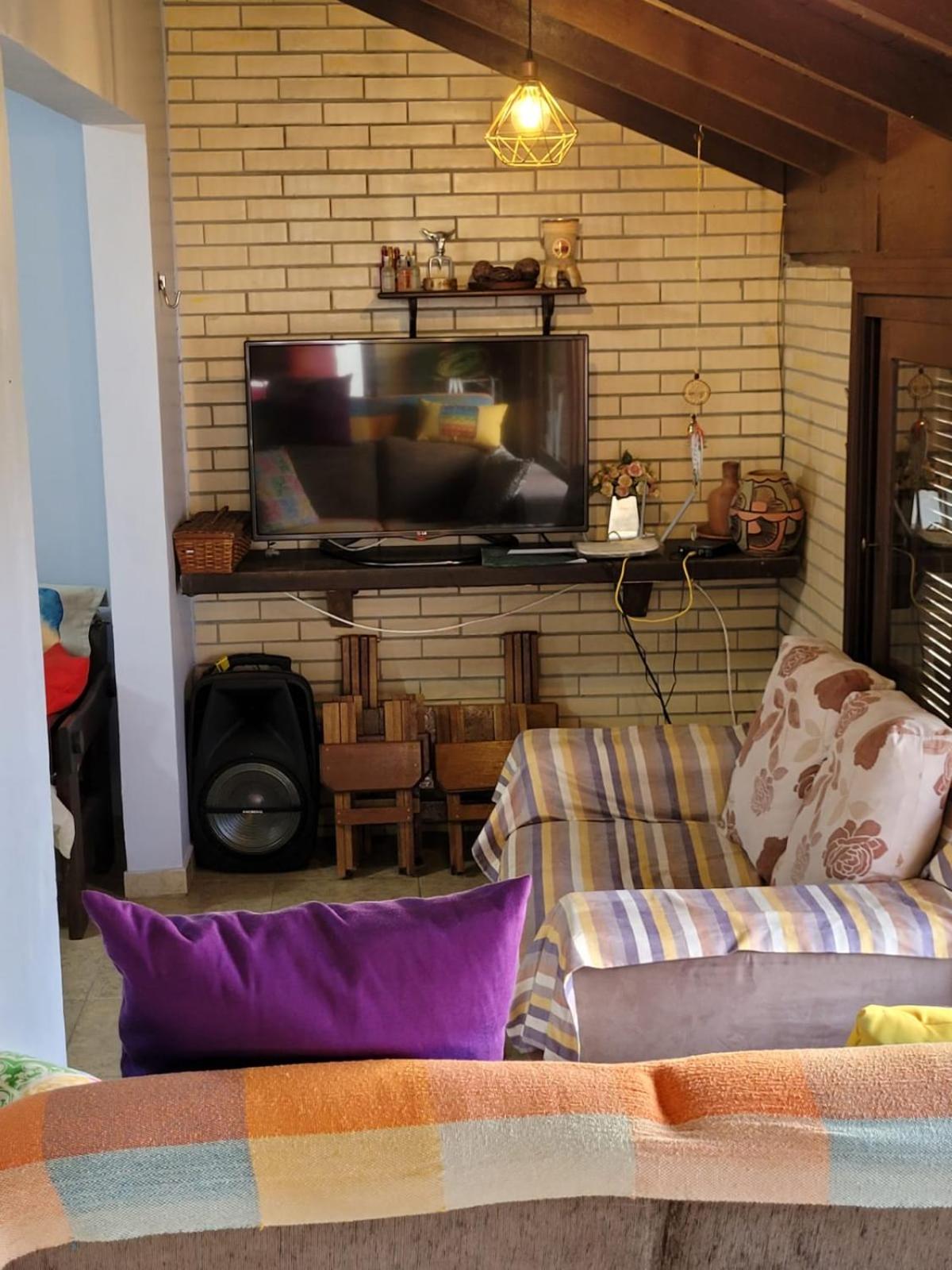 Casa com piscina a 50 metros da praia