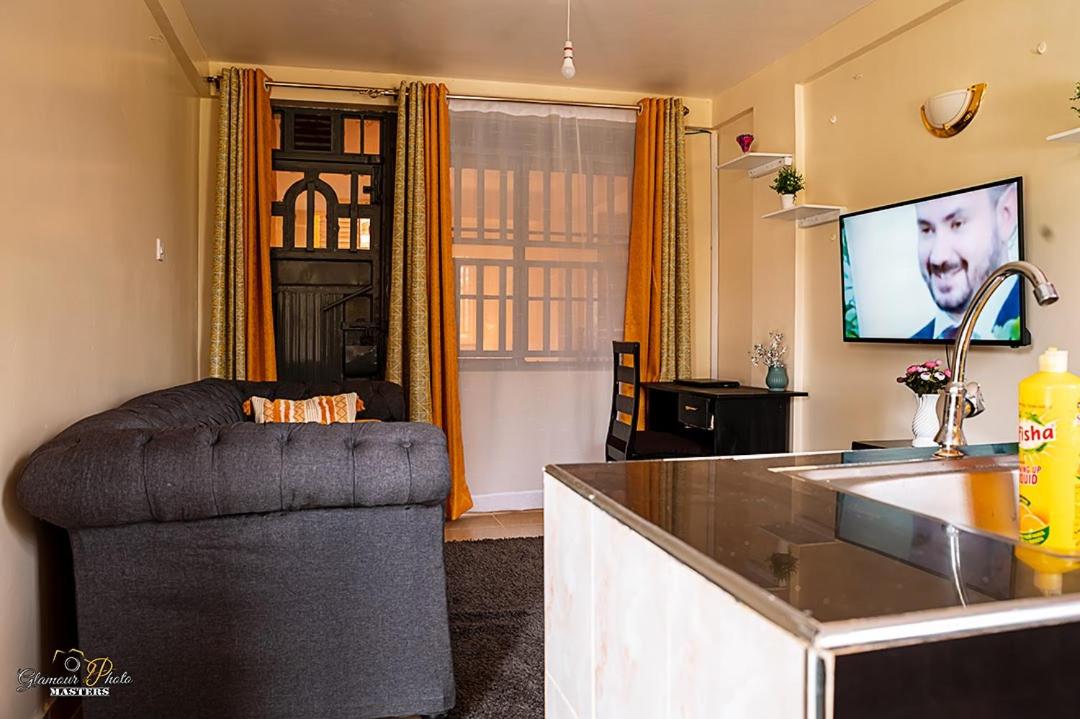 STYLISH 1BR APARTMENT IN KISUMU: FAST WI-FI, NETFLIX, SECURE PARKING view 2