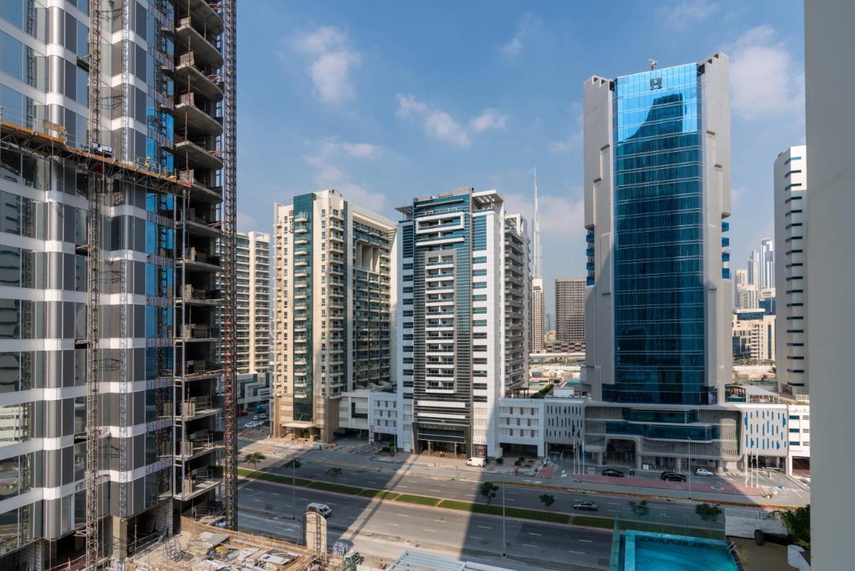 Vacay Lettings - 1BHK convertible to 2BHK in Business Bay