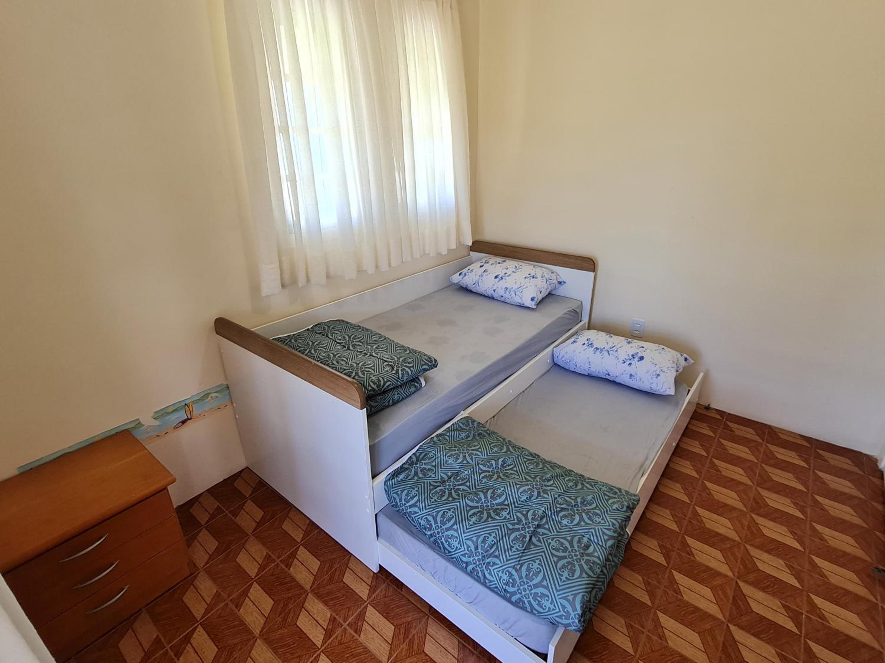 Ampla casa com 5 quartos e vista para o mar