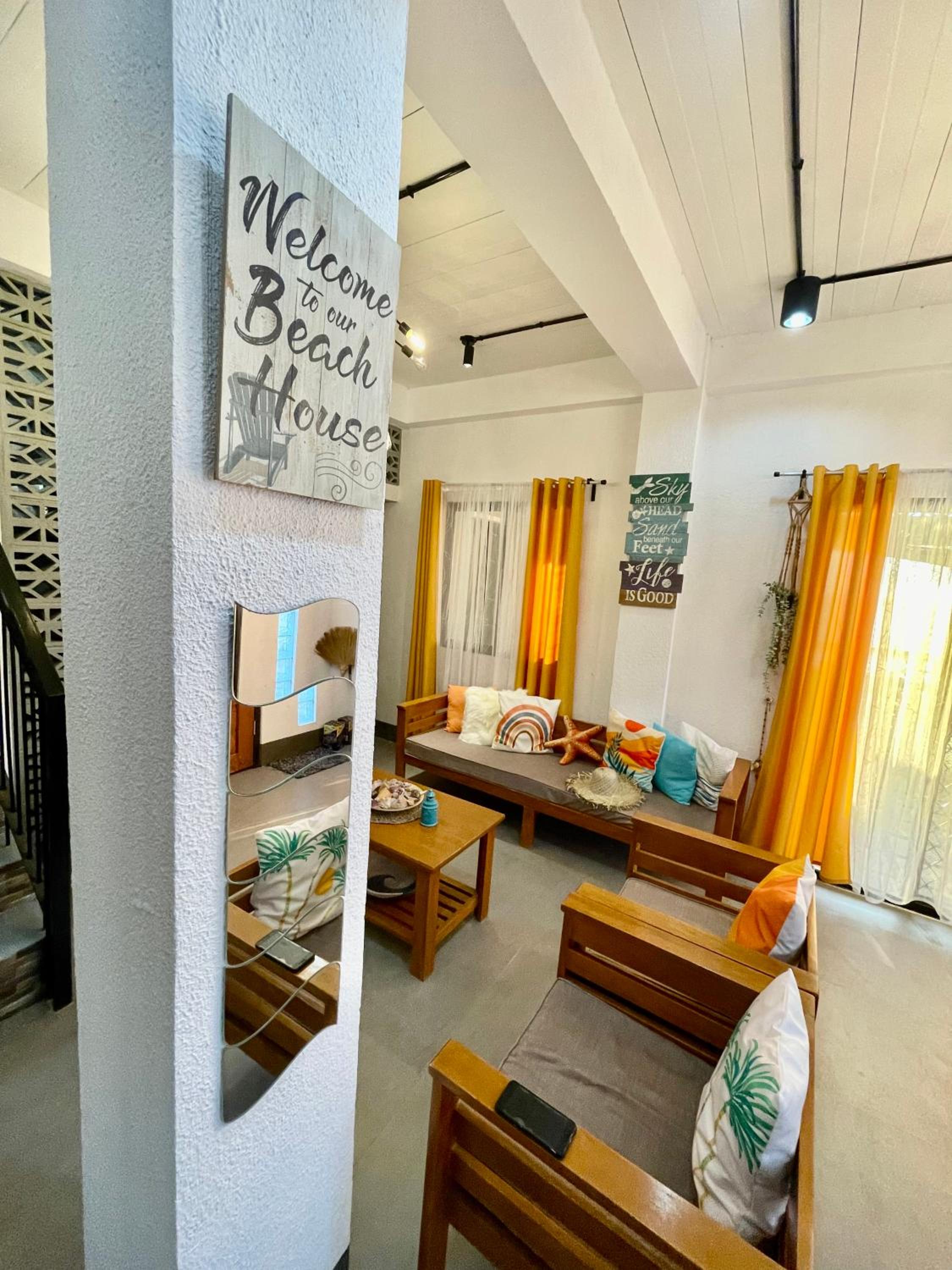 REEF HOUSE BACNOTAN beige sand beach front with Swimming pool