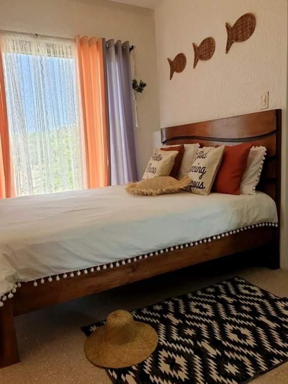 REEF HOUSE BACNOTAN beige sand beach front with Swimming pool