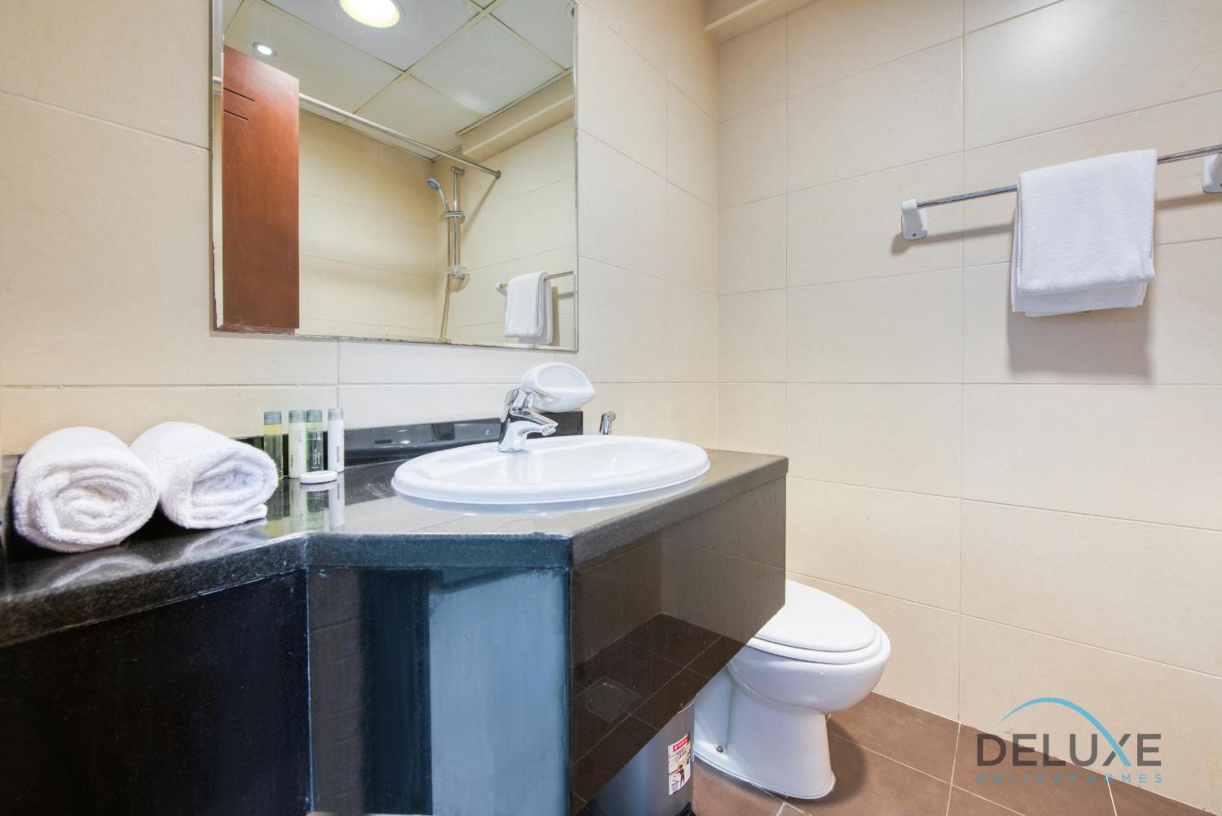 Serene Studio in Elite Residences 4 Sports City by Deluxe Holiday Homes