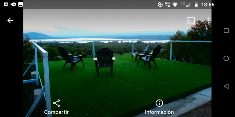 Cabaña frente al Lago San Roque Vista única pileta infinito wifi