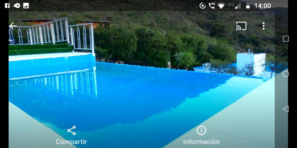 Cabaña frente al Lago San Roque Vista única pileta infinito wifi