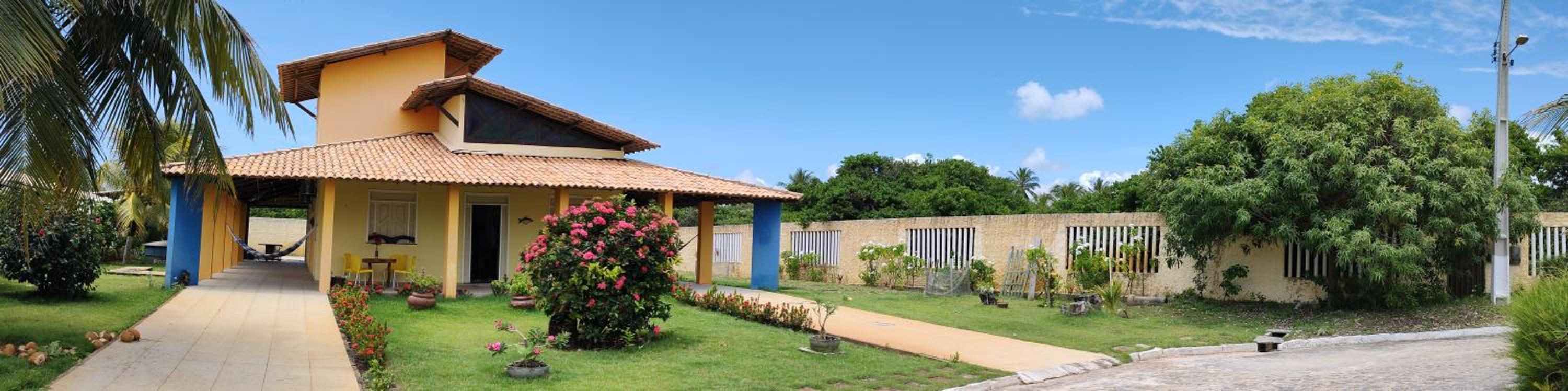 Casa de praia condomínio fechado, frente para o mar