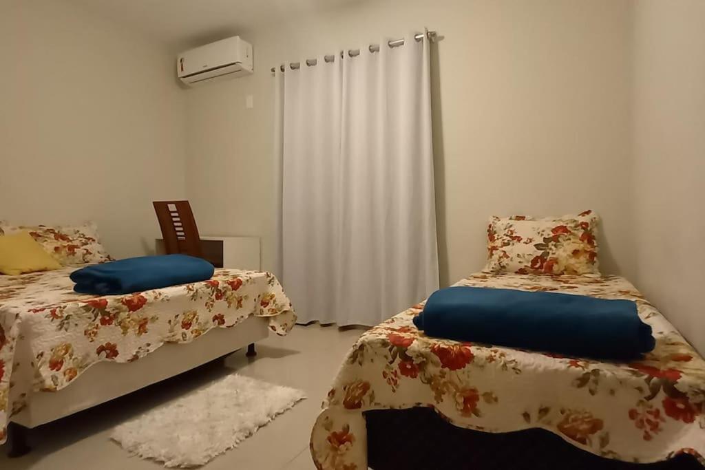 Casa COMPLETA-ÓTIMO WIFI-Espaço PET-TV Ilimitada-03 carros-Até10 pessoas