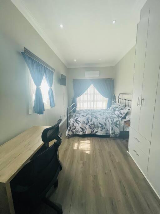 Private Modern 10 bdrm Home tucked away in Sandton
