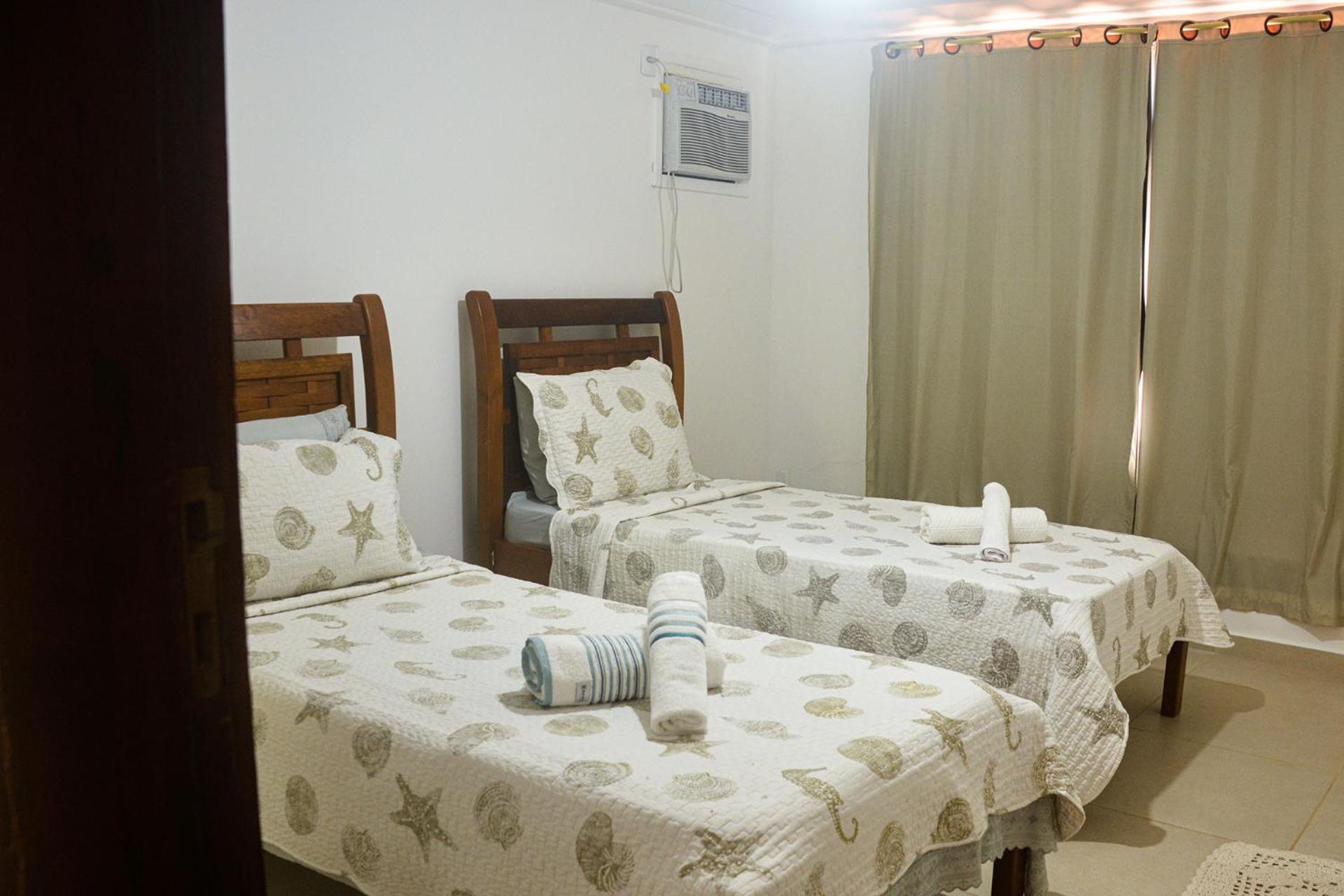 Casa pé na areia com varanda gourmet em Búzios RJ