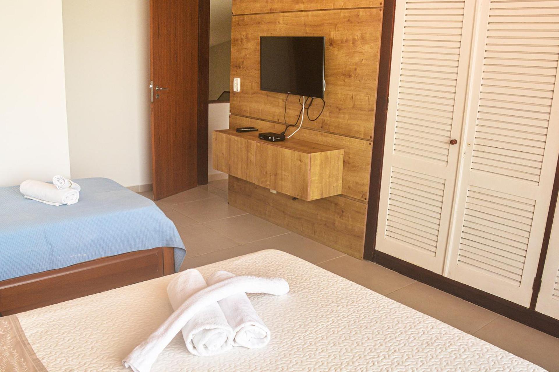 Casa pé na areia com varanda gourmet em Búzios RJ