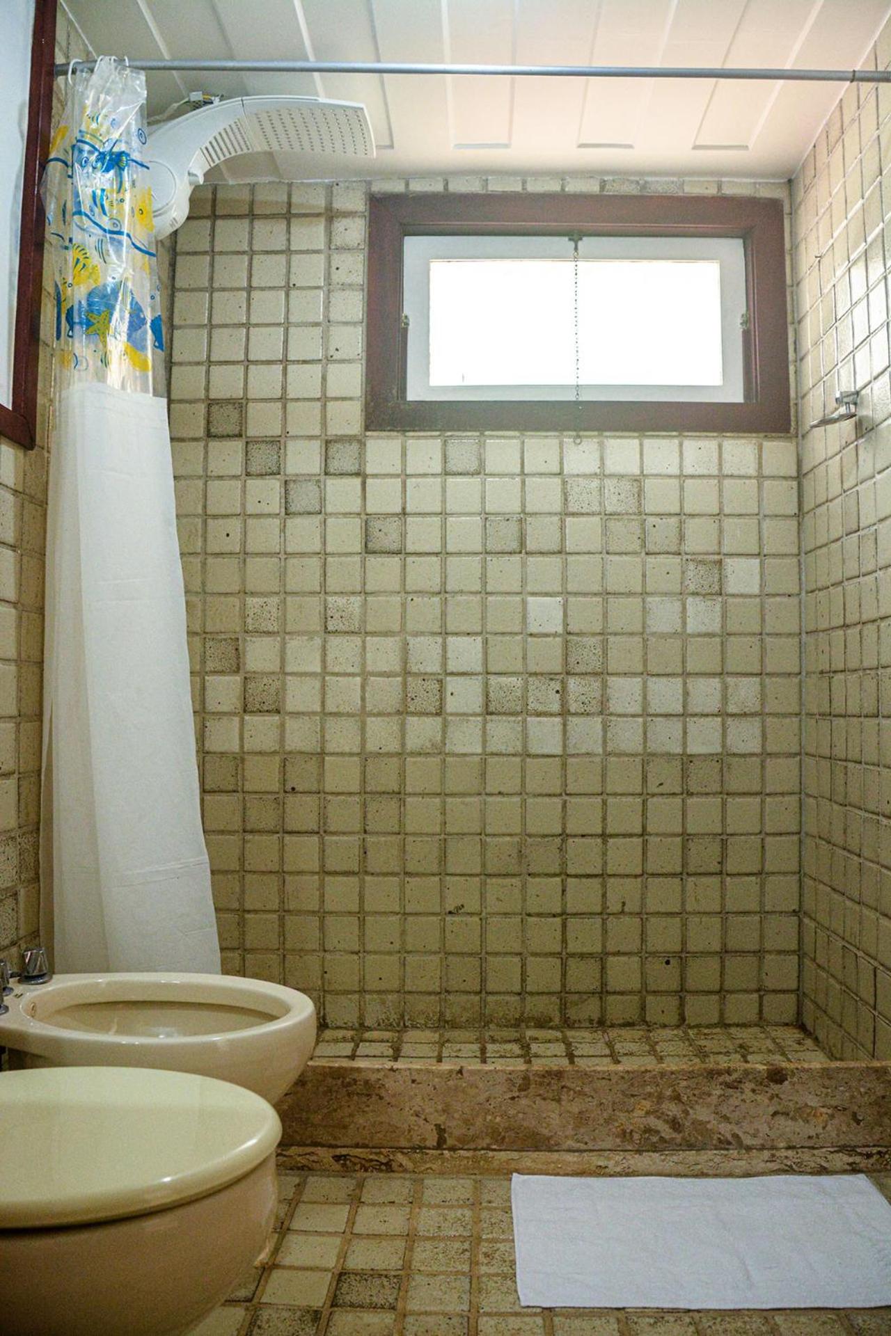 Casa pé na areia com varanda gourmet em Búzios RJ