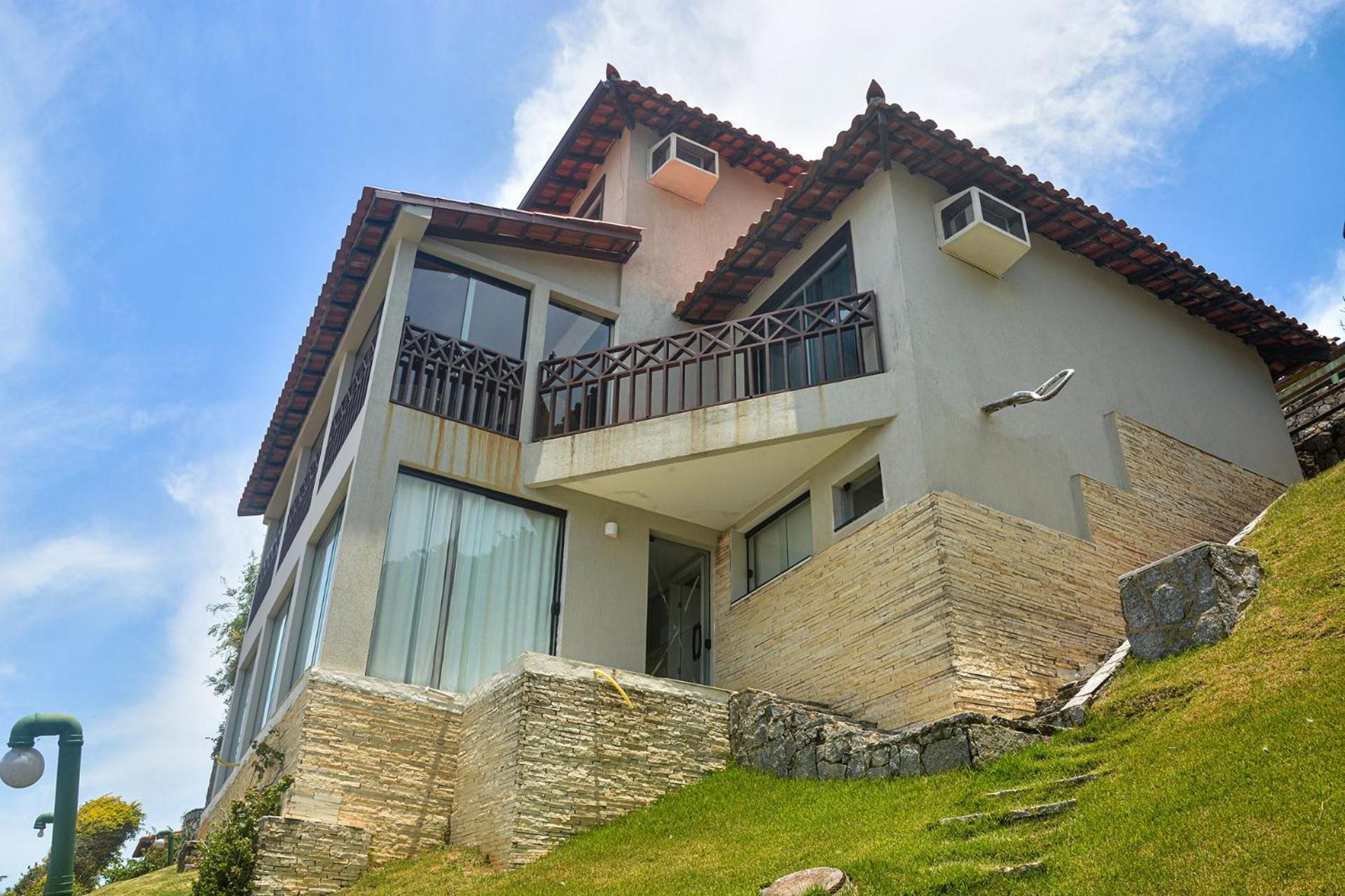 Casa pé na areia com varanda gourmet em Búzios RJ