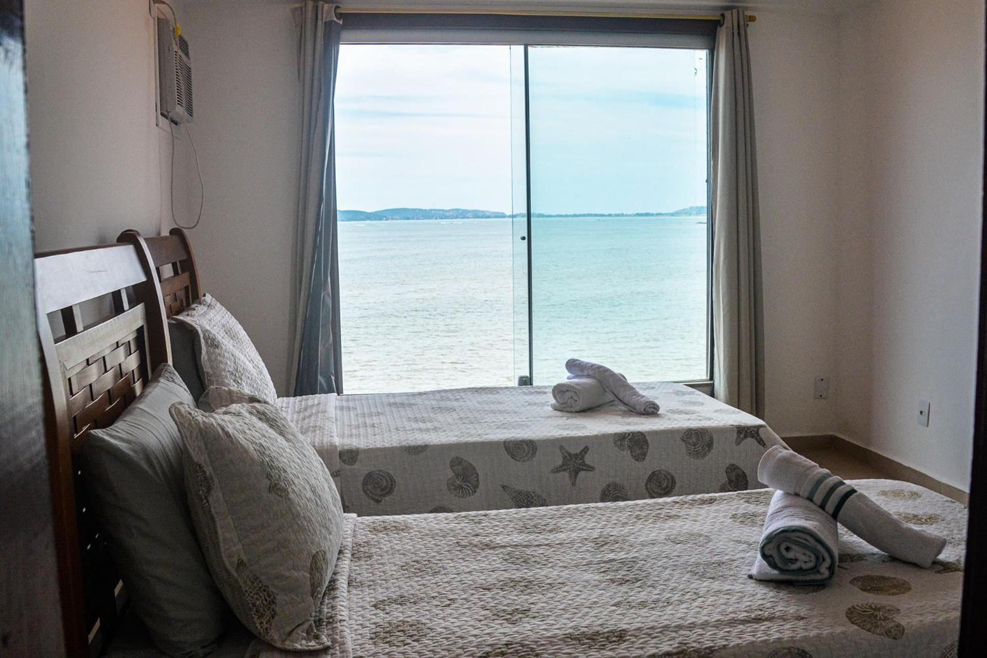 Casa pé na areia com varanda gourmet em Búzios RJ