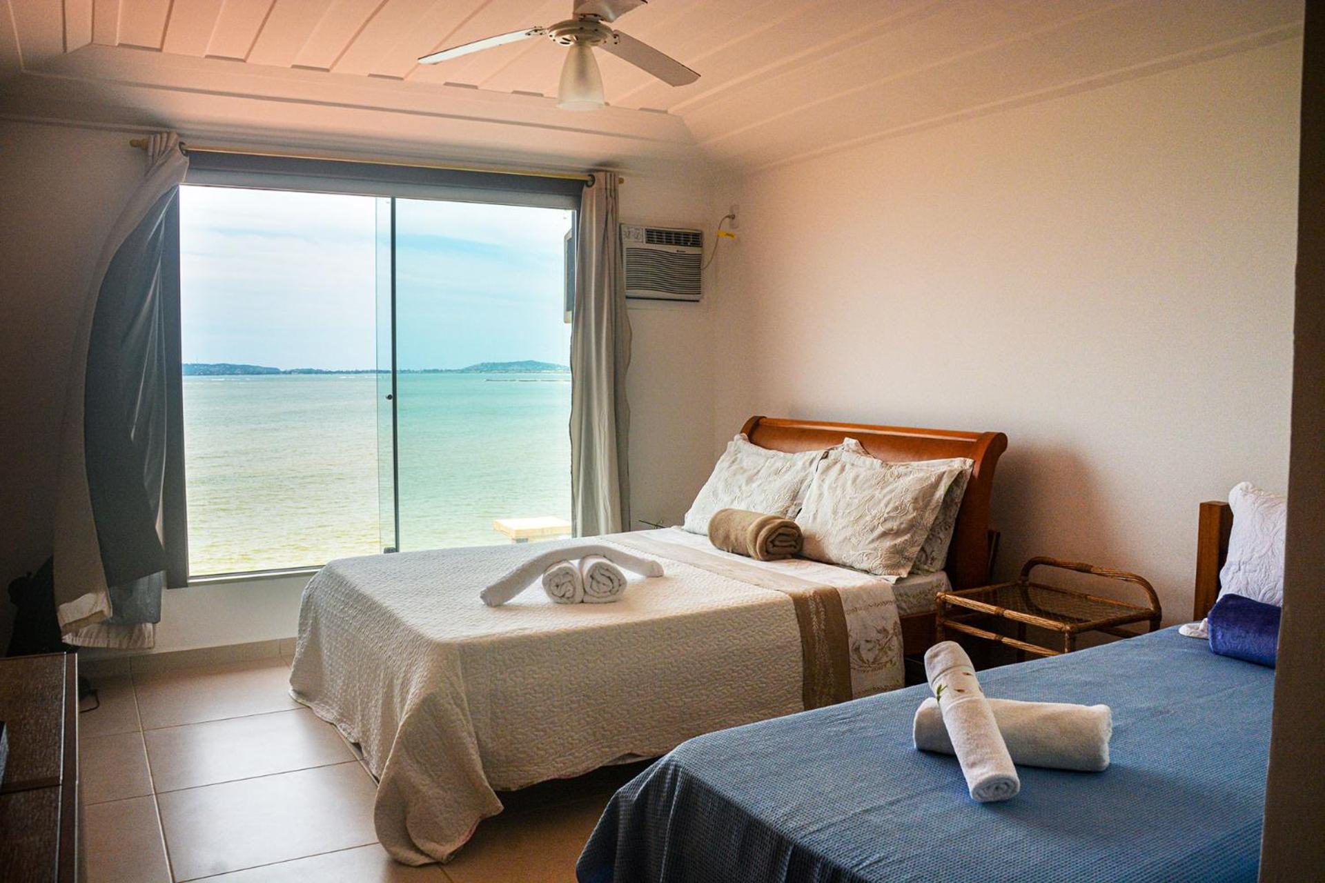 Casa pé na areia com varanda gourmet em Búzios RJ
