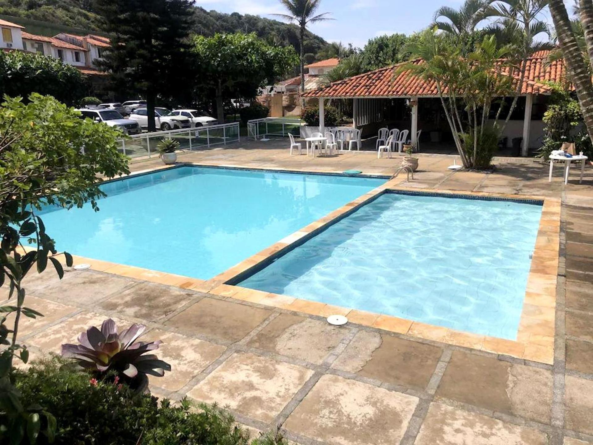 Casa pé na areia com varanda gourmet em Búzios RJ