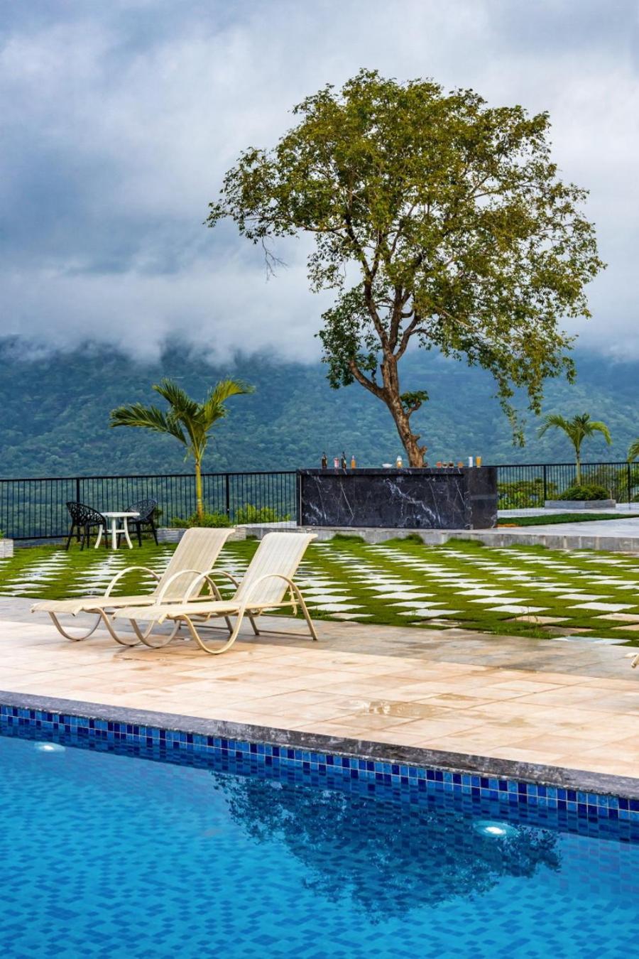 SaffronStays Sundowner - 8BR Morbe-view villa, grand pool, outdoor bar, gazebo, TT & pool table, rain dance, award-winning view 2