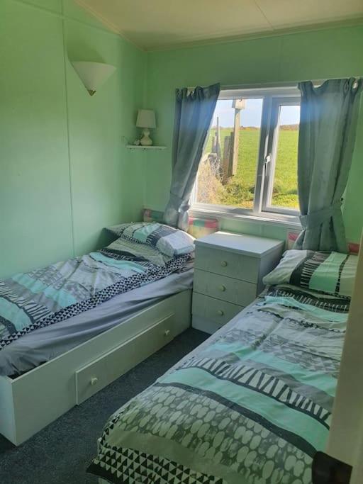 On farm Chalet, sleeps 6, Rhoshirwaun view 3