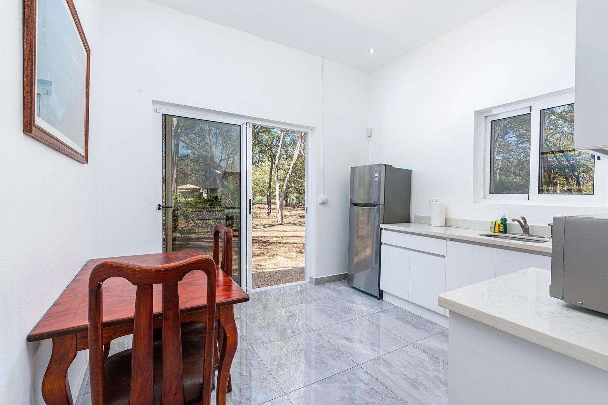 Modern Home and Guesthouse in a Peaceful Gated Community with a Private Swimming Pool