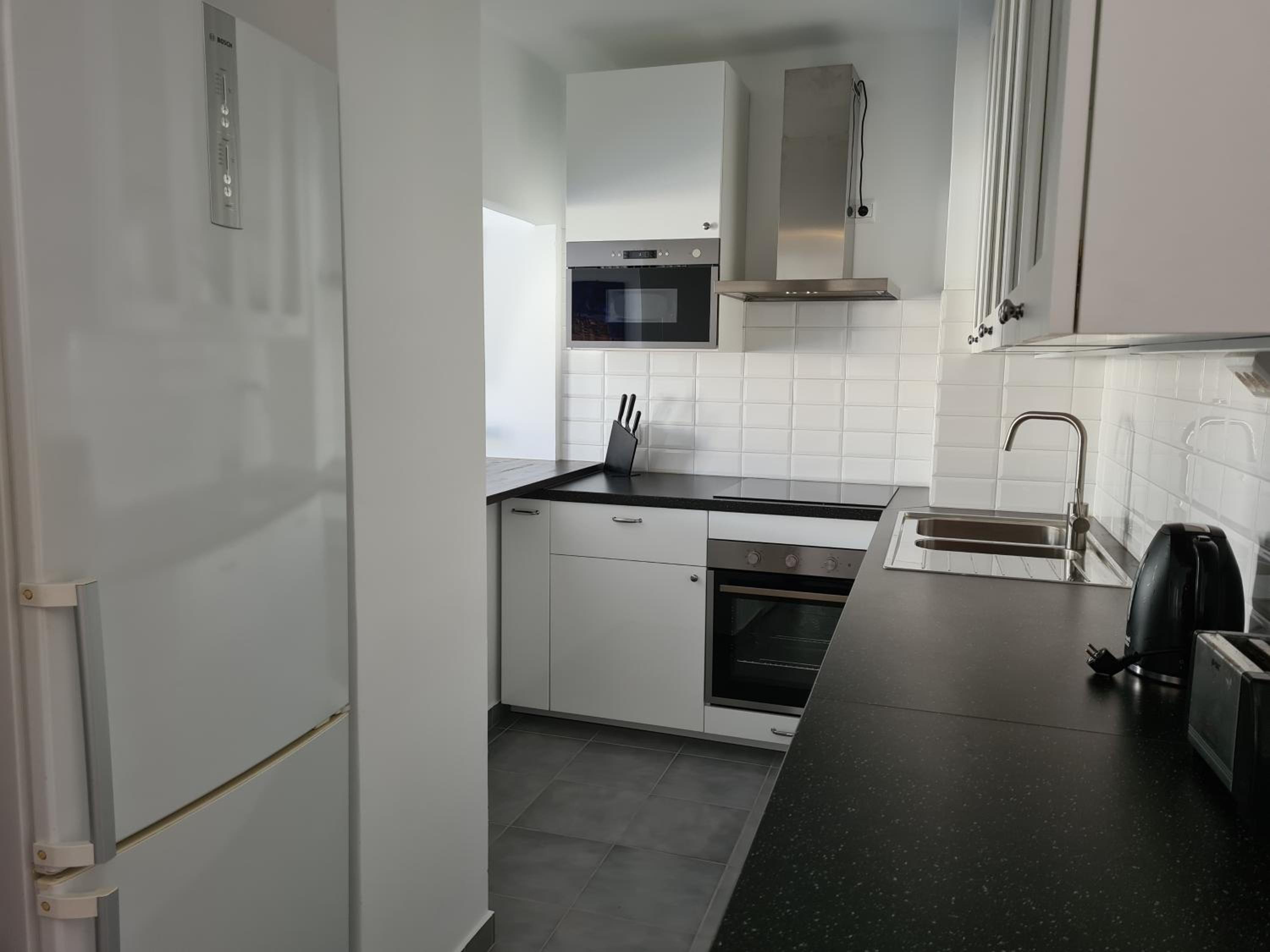 APARTAMENTOS ALBAIDA en Nerja — kitchen