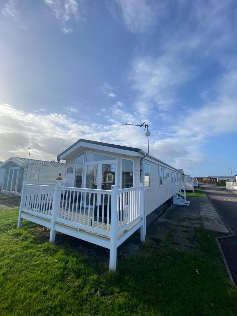 E3 is a 2 Bedroom 6 berth Lodge on Whitehouse Leisure Park in Towyn near Rhyl close to beach with decking and private parking space This is a pet free cara view 3