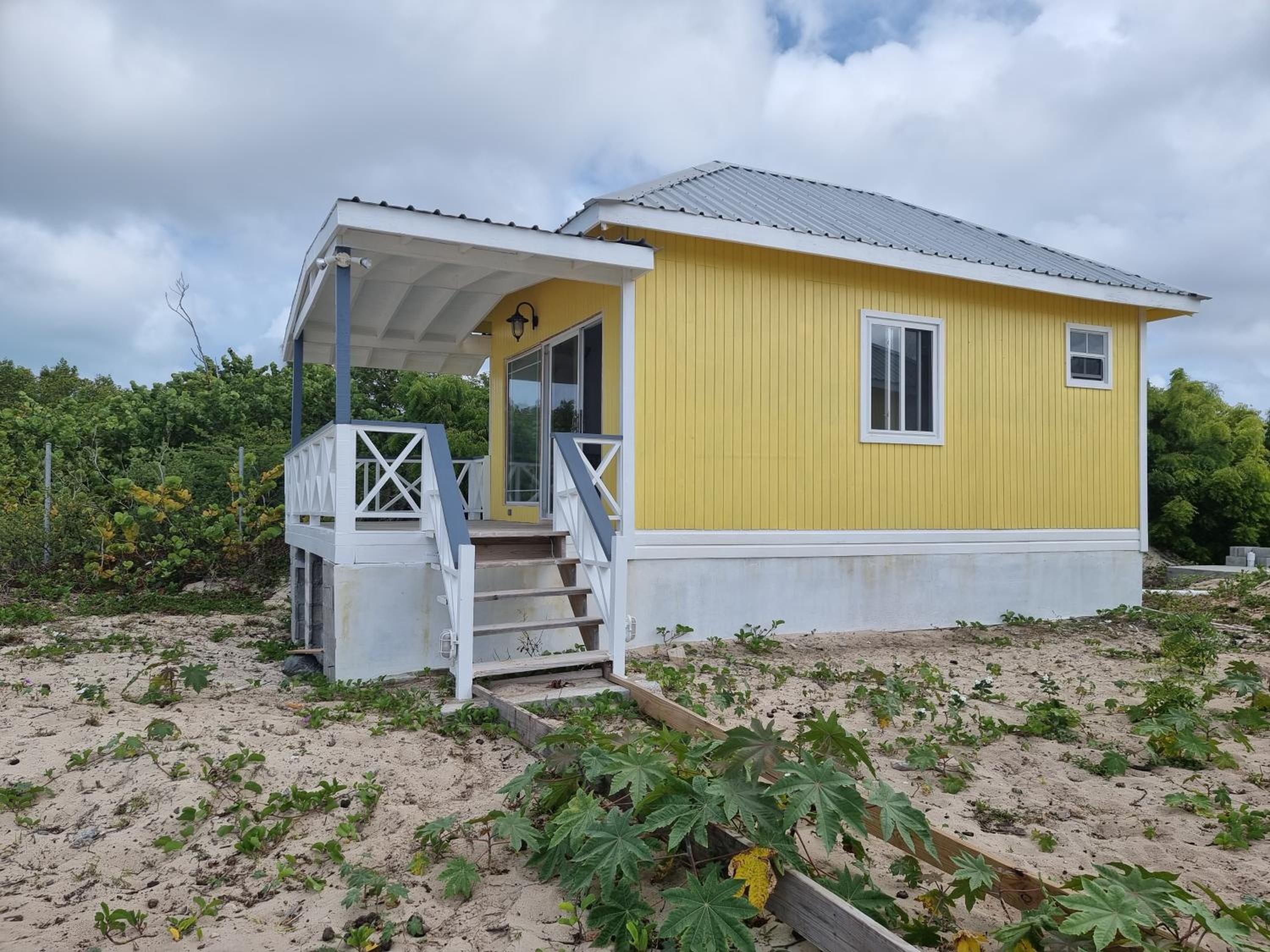 Harrys Cottages Cottage 5 right on the pink sand