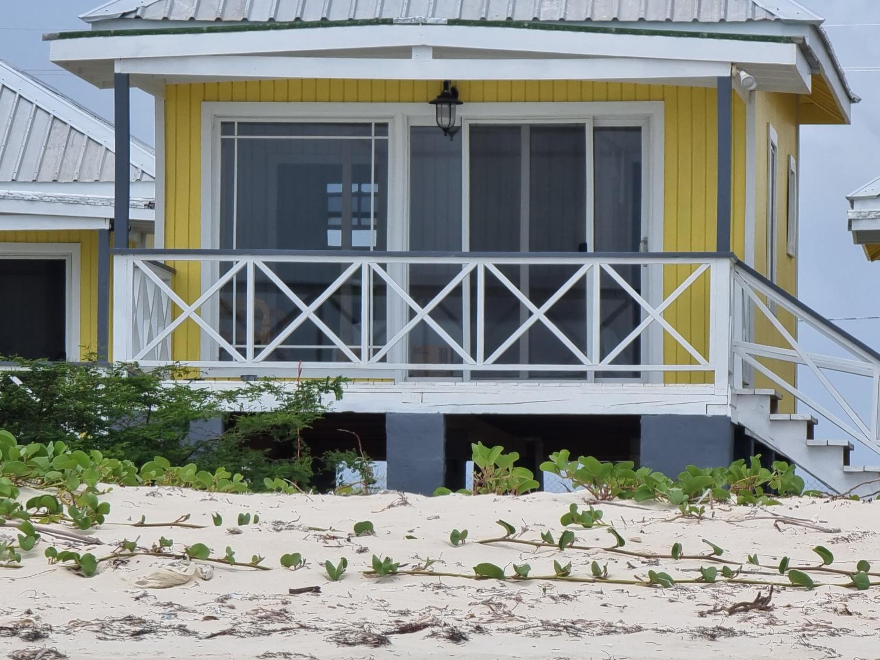 Harrys Cottages Cottage 5 right on the pink sand