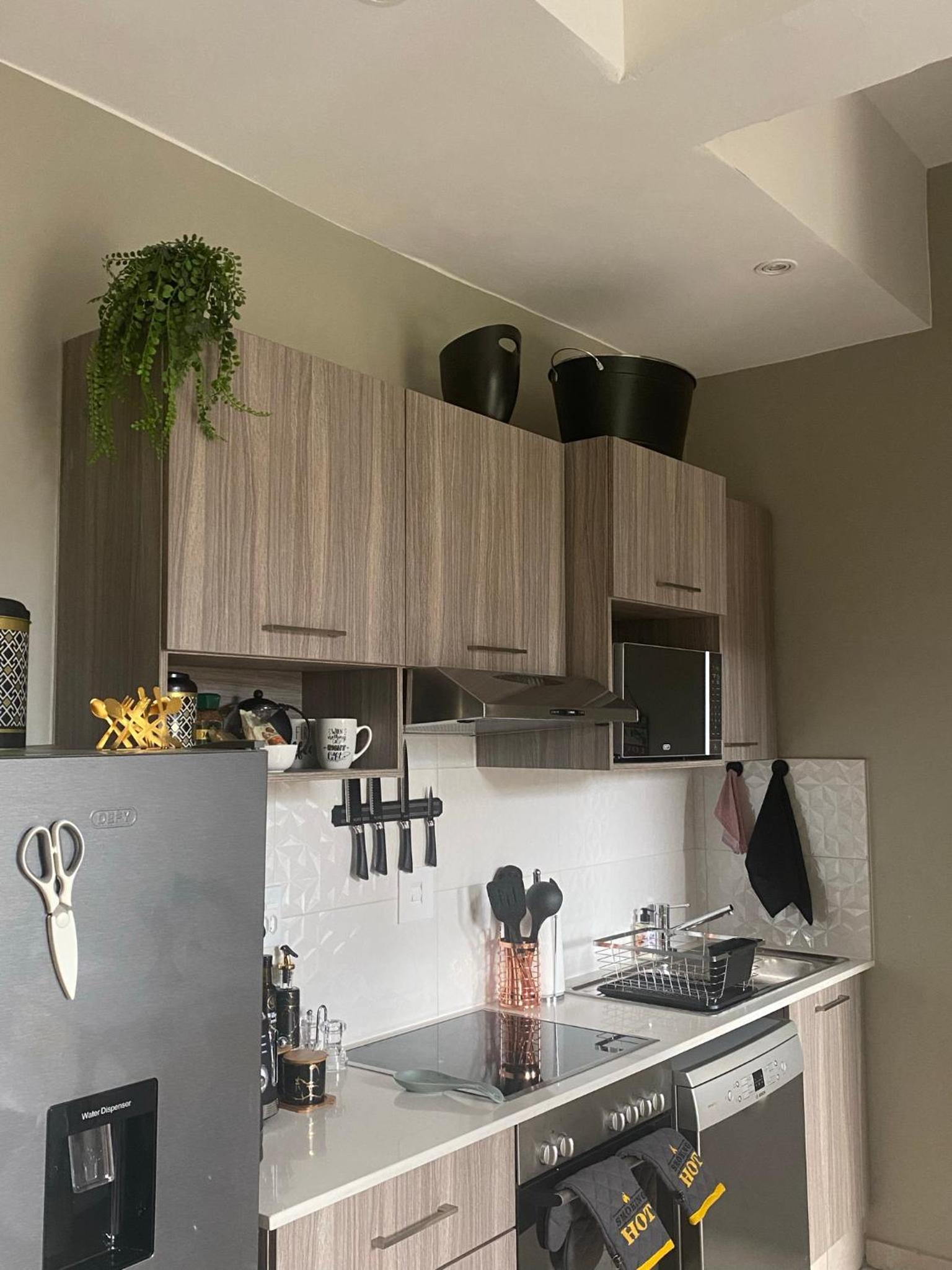 Lovely Rosebank 1-bedroom condo with pool & cinema