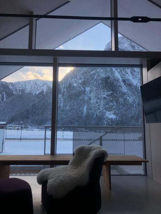 Modern Alpine Penthouse with Lake View