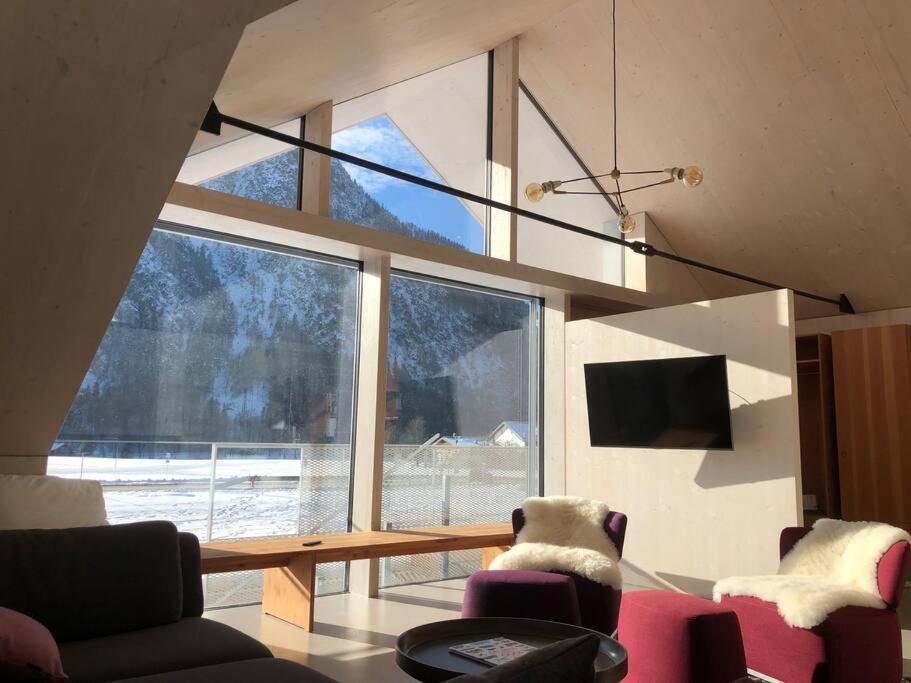 Modern Alpine Penthouse with Lake View