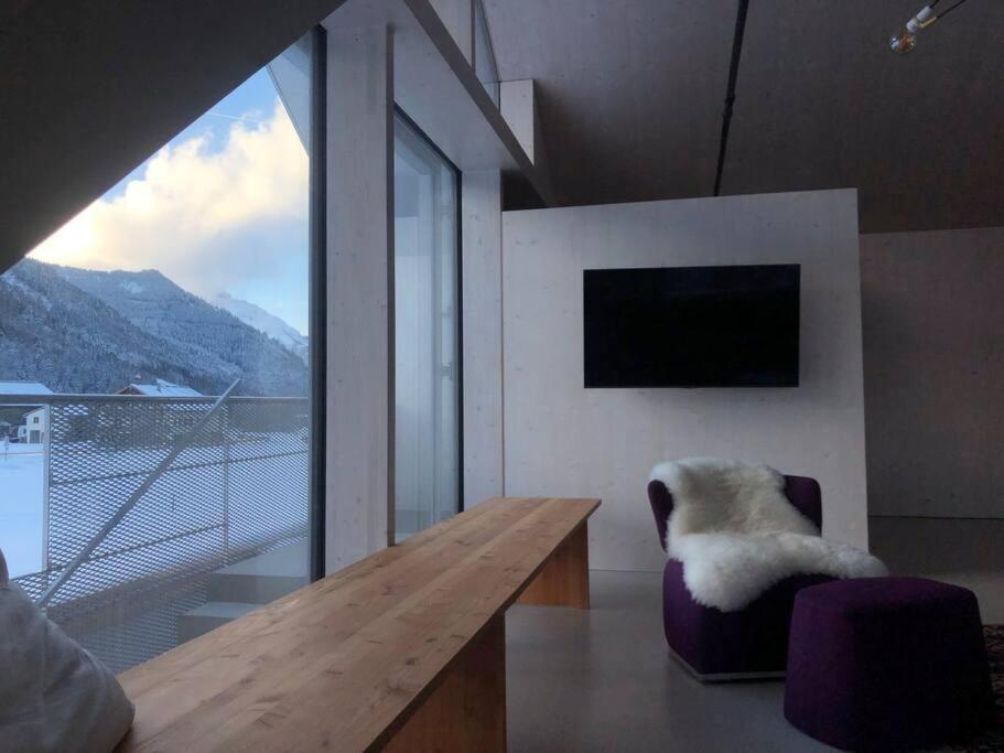 Modern Alpine Penthouse with Lake View
