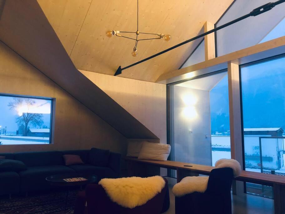 Modern Alpine Penthouse with Lake View