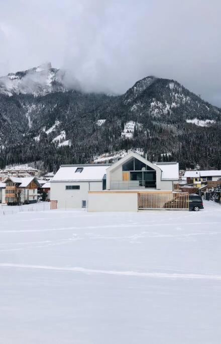 Modern Alpine Penthouse with Lake View