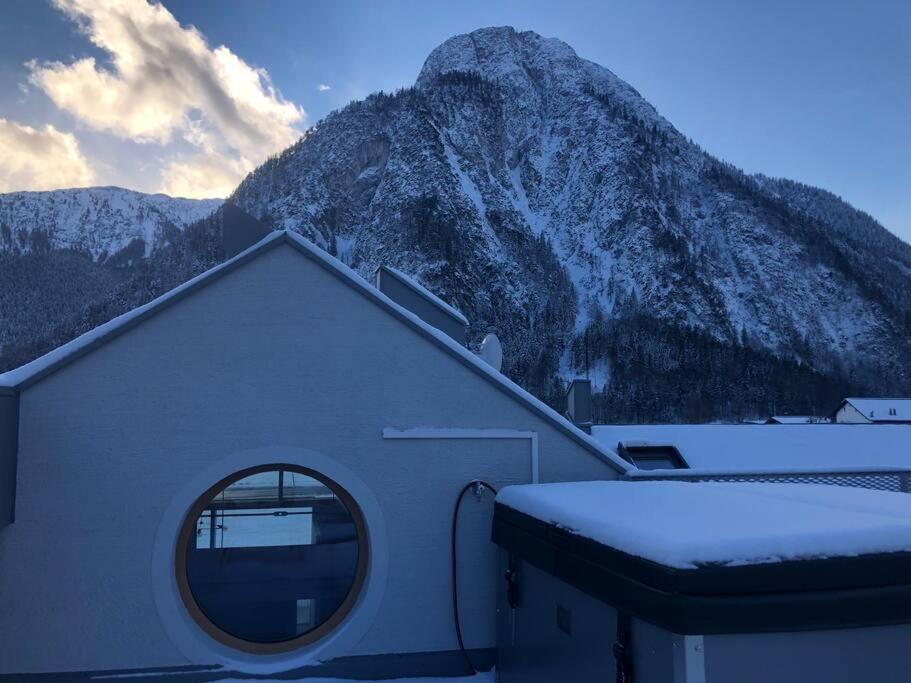 Modern Alpine Penthouse with Lake View