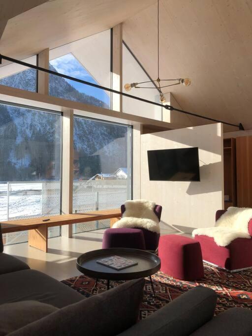 Modern Alpine Penthouse with Lake View