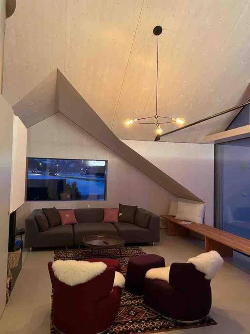Modern Alpine Penthouse with Lake View