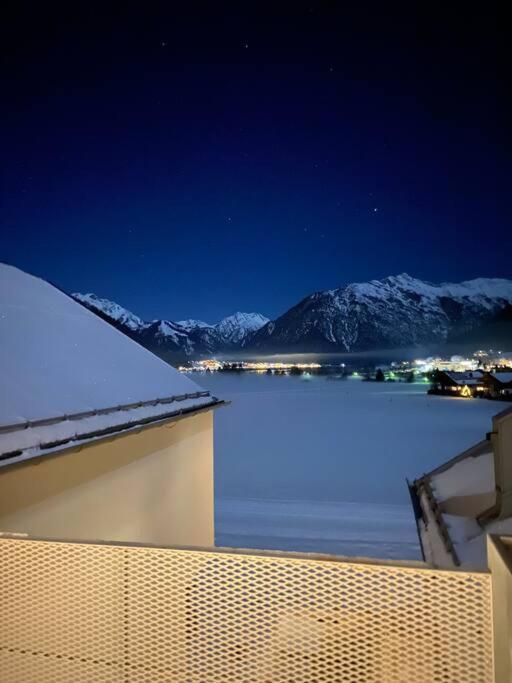 Modern Alpine Penthouse with Lake View