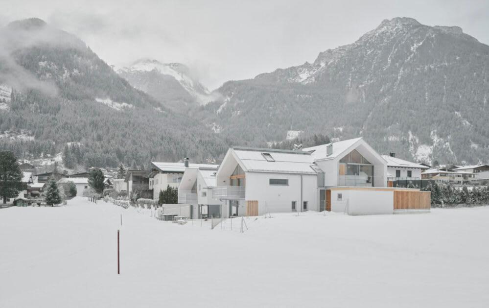 Modern Alpine Penthouse with Lake View
