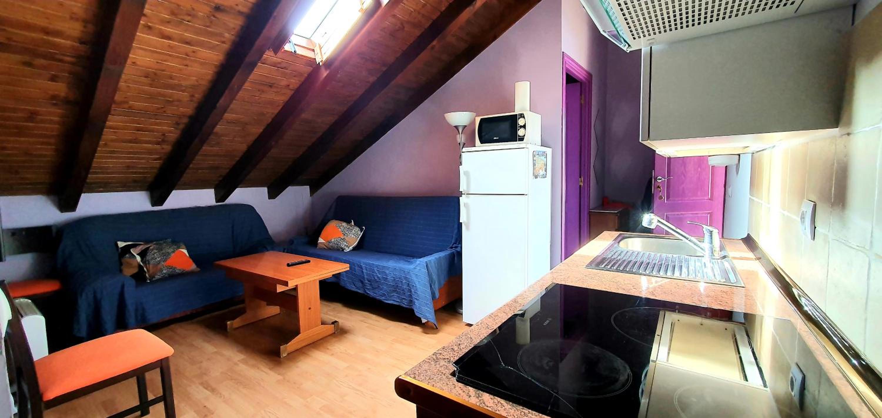 Apartamentos El Puntual