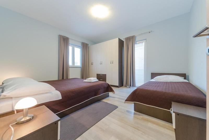 Apartments Maestral 70m from the beach - by TA Leut Agency view 5