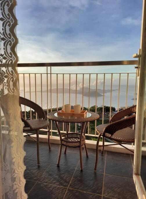 1 BR Cozy Farmhouse-Style Condo with Balcony & Taal View at Wind Residences view 2