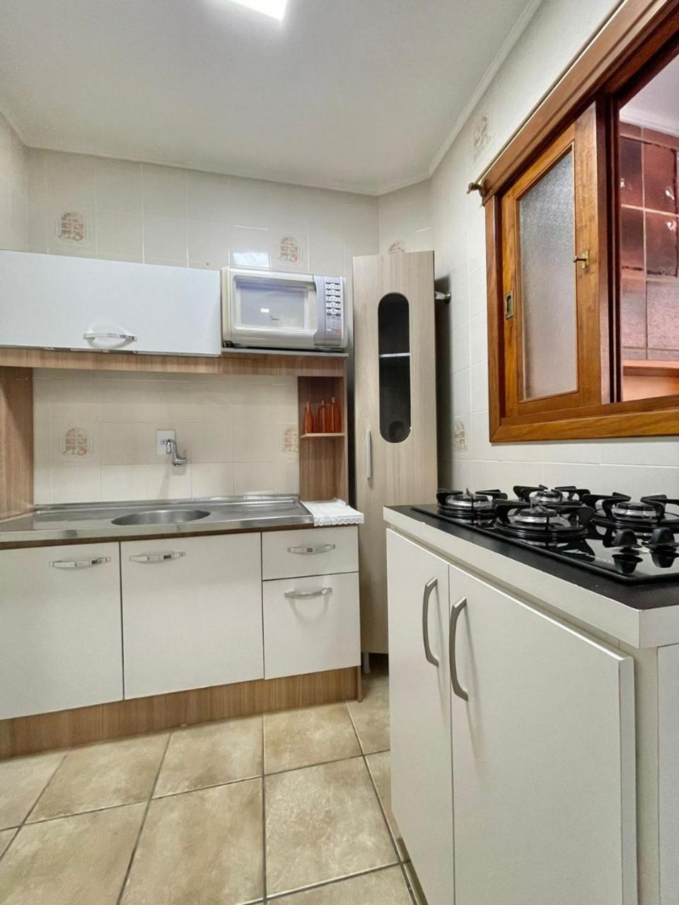 Apartamento acolhedor com churrasqueira view 2