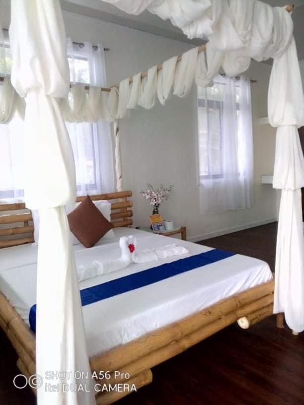 La Cala Beach House at Puerto Silanguin