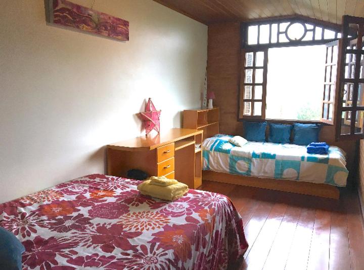 Casa aconchegante na montanha à 15min do centro!