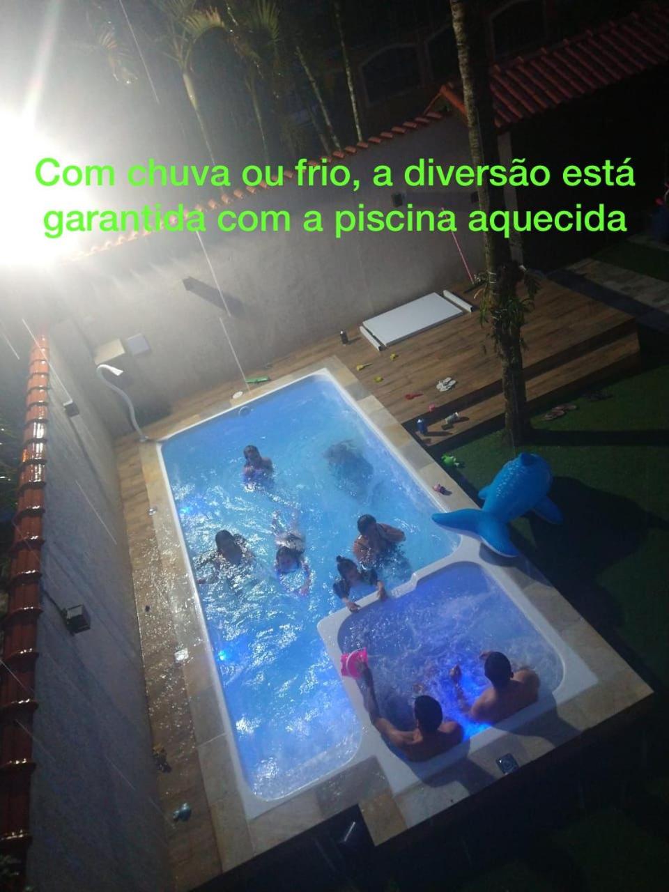 Casa de praia, piscina aquecida, cervejeira e bilhar