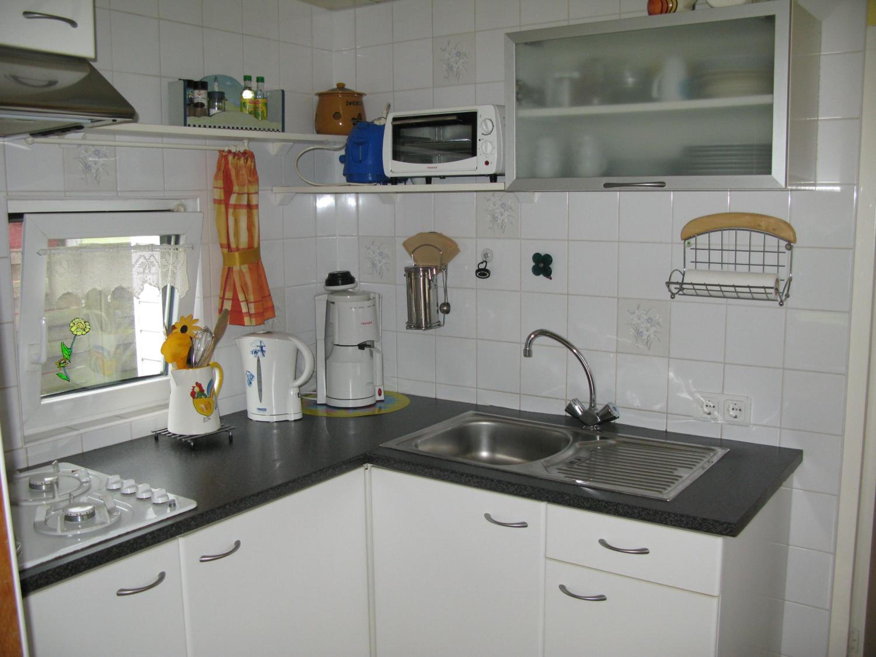 Ferienpark Vislust Chalet direkt an der Gracht mit Bootsanlegesteiger